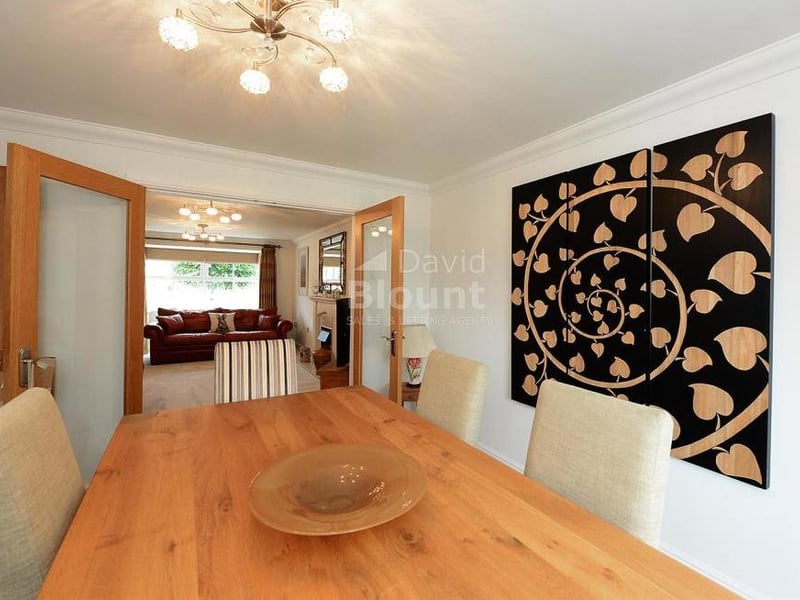 Please take your seat in the dining room. It has a uPVC bay window overlooking the garden, a radiator and ceiling cornice.