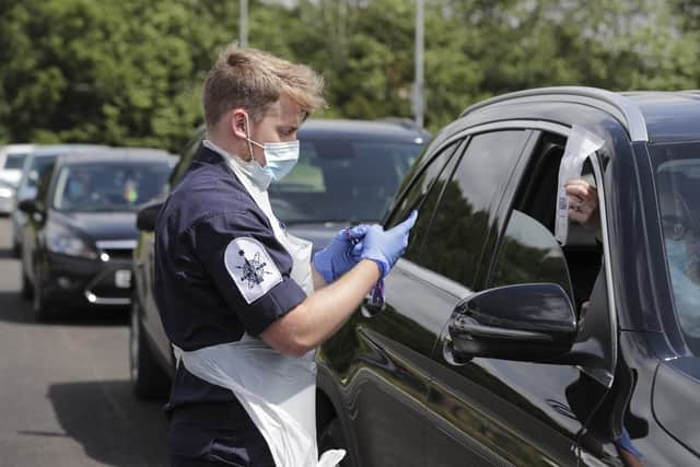 Pictured: Royal Navy personnel operate a mobile testing unit in Hampshire. Photo: LPhot Belinda Alker