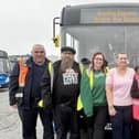 Benita and her family, at the Stagecoach Portsmouth depot, alongside Colin Ashcroft, Operations Manager