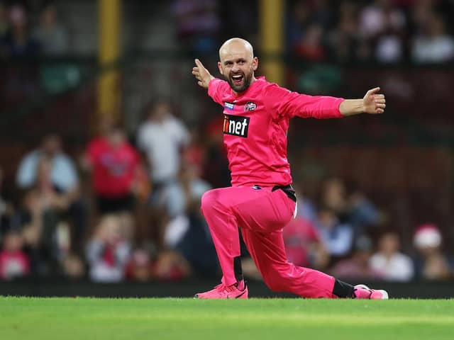 Nathan Lyon celebrates a wicket while playing for the Sydney Sixers earlier this year. Photo by Mark Kolbe/Getty Images.