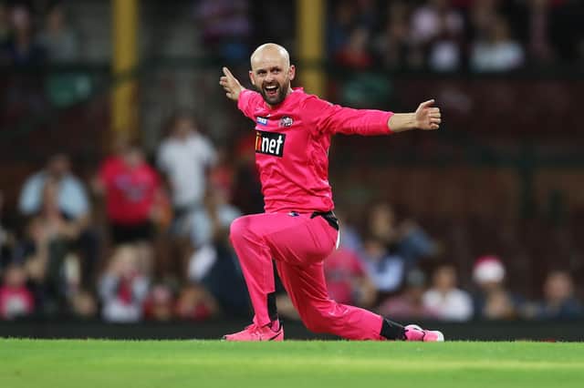 Nathan Lyon celebrates a wicket while playing for the Sydney Sixers earlier this year. Photo by Mark Kolbe/Getty Images.