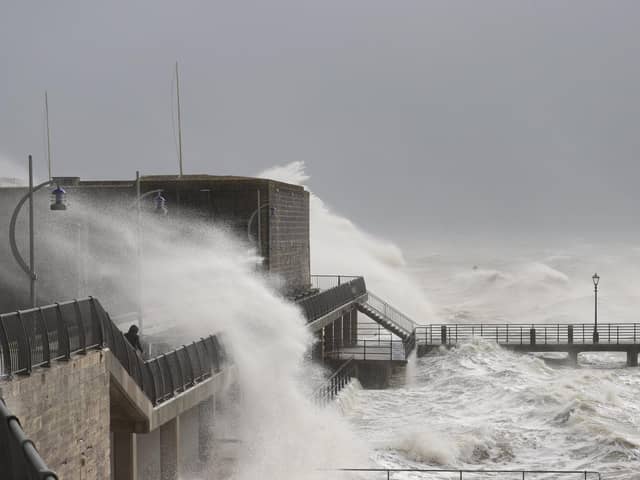Pictured are the waves caused by Storm Eunice in 2022. Photos by Alex Shute