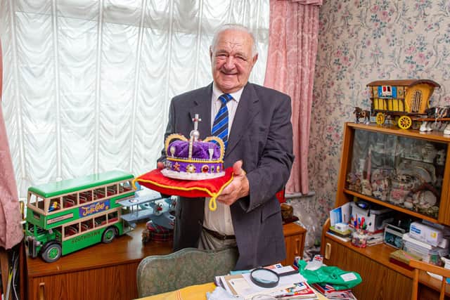 Cliff Cresdee at his home in Fareham with The Crown with Jewels he made and other models. Picture: Habibur Rahman