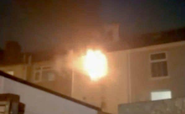 The blaze caused by the firework at Hester Road, Southsea, on New Year's Eve 2020. Pictured: Stills from video