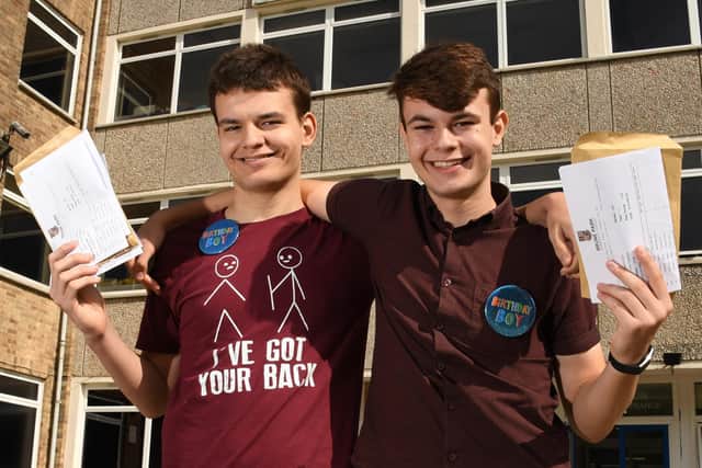 GCSE results day at Brune Park Community School in Gosport - 20/8/20. Pictured are twins L-R Ollie and Andrew Gamble who are 16 today.
Photo: Paul Jacobs