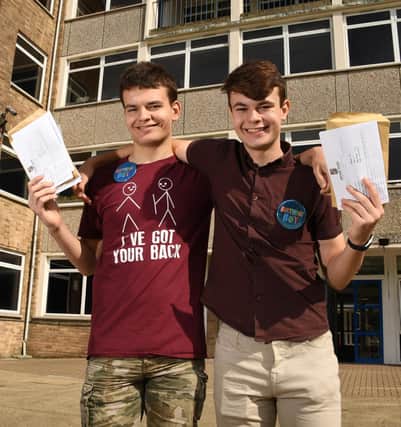 GCSE results day at Brune Park Community School in Gosport - 20/8/20. Pictured are twins L-R Ollie and Andrew Gamble who are 16 today.
Photo: Paul Jacobs