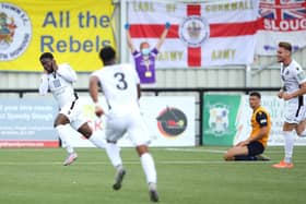 Luke Wanadio, left, wheels away after scoring Dartford's final goal in their 3-0 play-off win at Slough Town. They will now face Hawks at Westleigh Park. Photo by Warren Little/Getty Images.