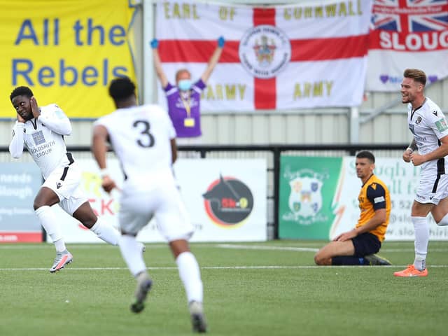 Luke Wanadio, left, wheels away after scoring Dartford's final goal in their 3-0 play-off win at Slough Town. They will now face Hawks at Westleigh Park. Photo by Warren Little/Getty Images.