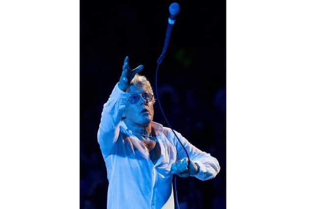 Roger Daltrey performs one of his signature microphone swings The Who and an orchestra at CMAC in Canandaigua, NY, 2018. Picture by William Snyder