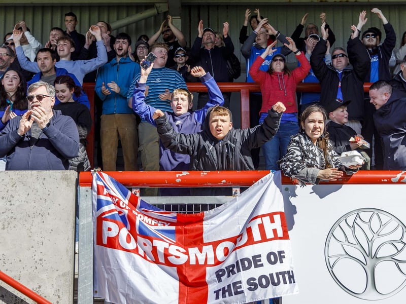 The Pompey fans celebrate Sean Raggett's goal in the 1-1 draw at Morecambe on April 18 ahead of their 289-mile trip back to the south coast.
