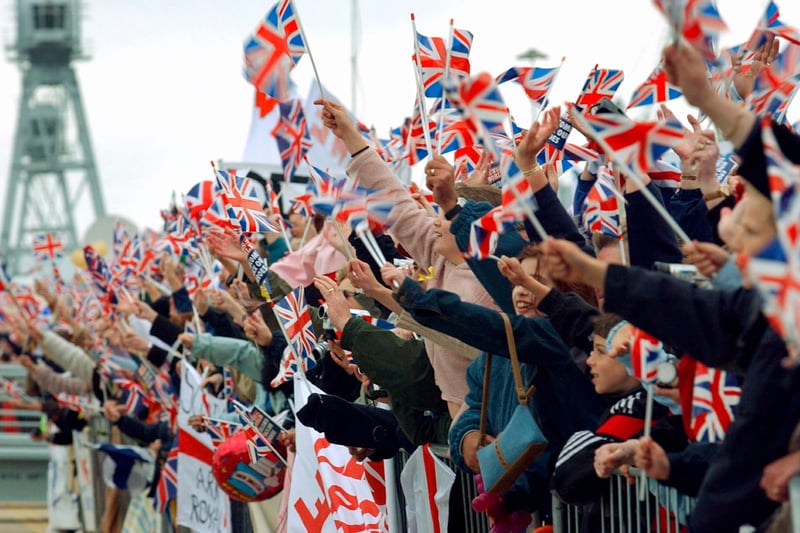Families pack the quayside to welcome back HMS Ark Royal from Iraq. Picture: Mick Young
