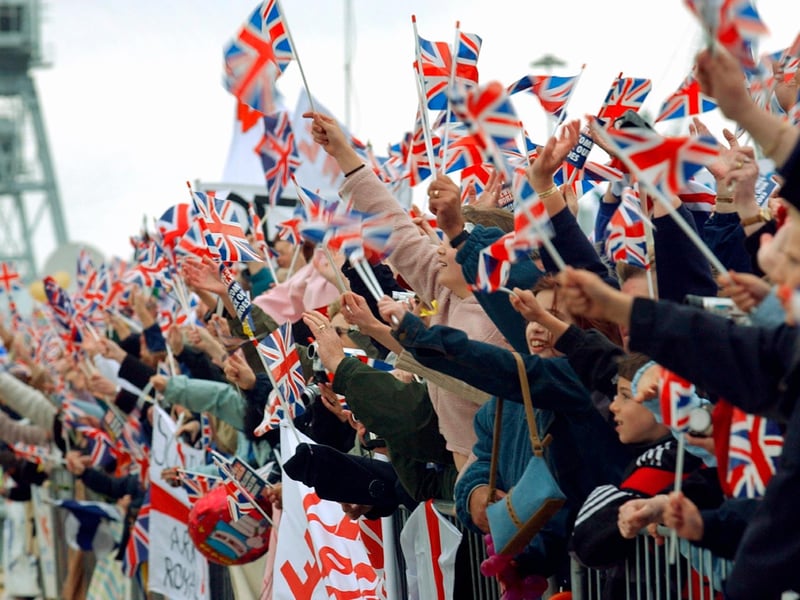 Families pack the quayside to welcome back HMS Ark Royal from Iraq. Picture: Mick Young