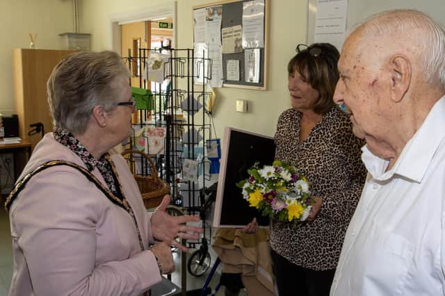 The mayor of Havant speaking to Ronald and Liz. Photo by Alex Shute