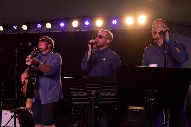 Victorious 2021 Sunday - The Southsea Alternative Choir play the Acoustic Stage . From left: Sam Richards, Charlie Waddington, Jim Lines.
Picture: Vernon Nash (290821-225)