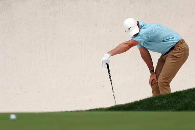 Rory McIlroy reacts to his shot from the bunker on the 13th hole during the first round of the 2023 Masters Tournament at Augusta National Golf Club Picture: Christian Petersen/Getty Images