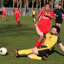 Baffins' Jack Williamson tackles Horndean's Leon Baker.
Picture: Sam Stephenson.