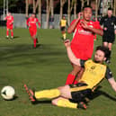 Baffins' Jack Williamson tackles Horndean's Leon Baker.
Picture: Sam Stephenson.