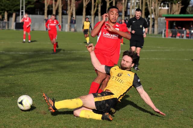 Baffins' Jack Williamson tackles Horndean's Leon Baker.
Picture: Sam Stephenson.