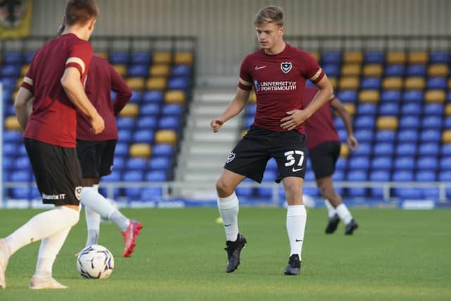 Dan Gifford warming up before Pompey's Papa John's Trophy encounter at AFC Wimbledon in September 2021 - his maiden first-team involvement. Picture: Jason Brown/ProSportsImages