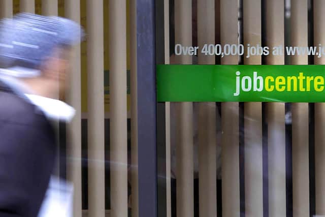 A person passing a Job Centre Plus. P aimed at helping jobless young people get back into work or education. Photo: Danny Lawson/PA Wire