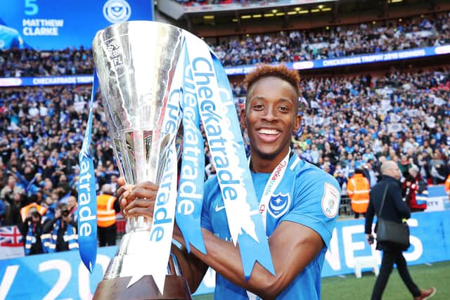 Jamal Lowe with the Checkatrade Trophy following Pompey's penalty shoot-out victory over Sunderland in March 2019. Picture: Joe Pepler
