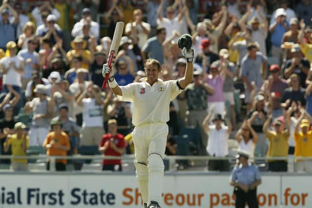 Matthew Hayden celebrates recording a new record innings in Test cricket against Zimbabwe in 2003. Photo by Hamish Blair/Getty Images.