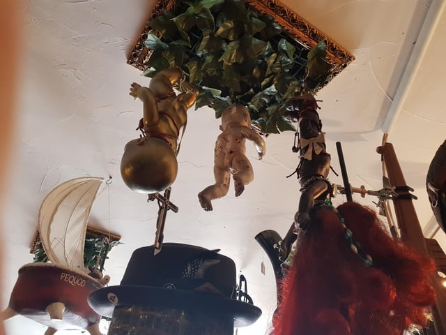 Dolls hanging from the ceiling