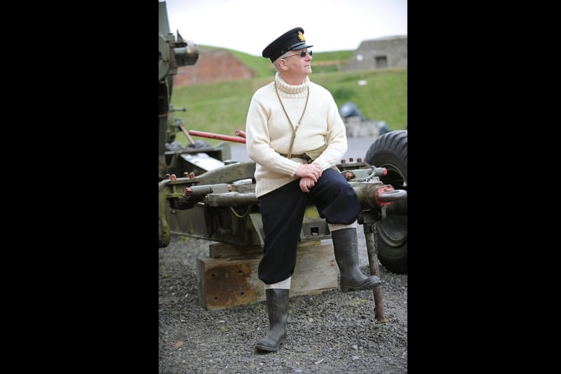 2010. Fort Nelson on 8th May, the 65th Anniversary of the end of the war in Europe. Geoff Pye (60) from Portsmouth, an interpreter at Fort Nelson taking the part of a Submariner Sub Lt.in WW11 before the visitors were invited to see a film about the Enigma Machine and Submarine U110. Picture: Malcolm Wells 101446-8948