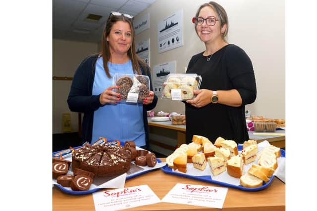 The Defence School of Marine Engineering has raised money for Sophie's Legacy by hosting cake sale. 
Pictured: Sam Martin and Lisa Down