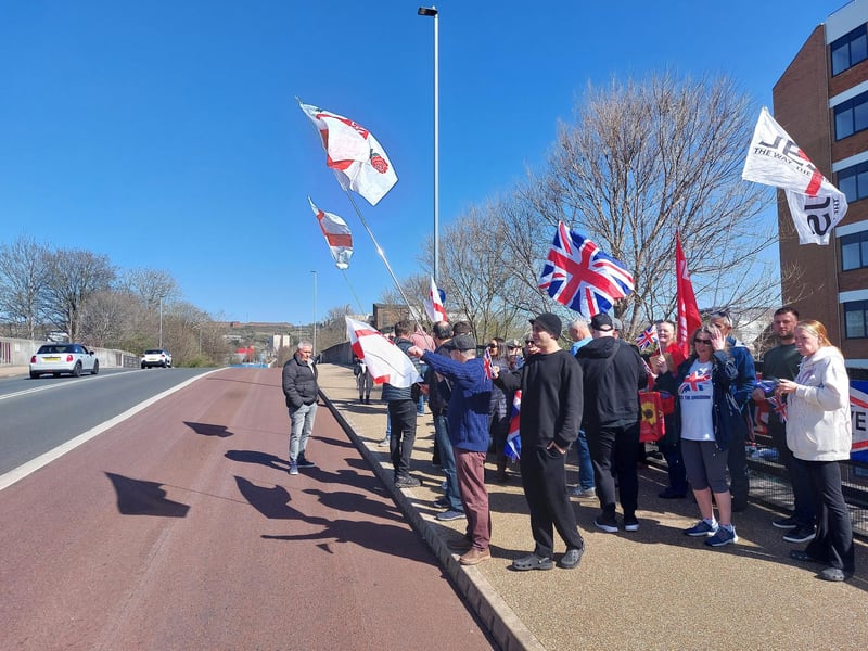 Illegal immigration protestors gathered outside Roebuck House in Cosham on Sunday, March 30.