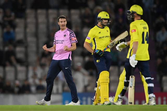 Toby Roland-Jones celebrates taking the wicket of Hampshire's James Fuller. Photo by Alex Davidson/Getty Images