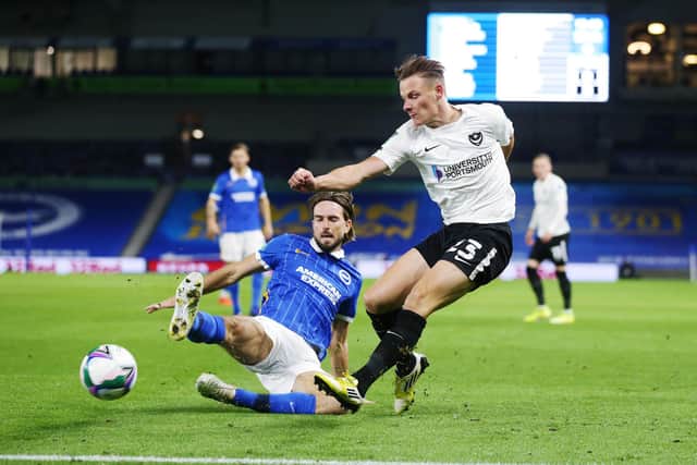 Cameron Pring's attempted cross is blocked by Brighton midfielder Davy Propper in the Carabao Cup clash. Picture: Joe Pepler