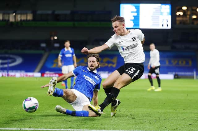 Cameron Pring's attempted cross is blocked by Brighton midfielder Davy Propper in the Carabao Cup clash. Picture: Joe Pepler
