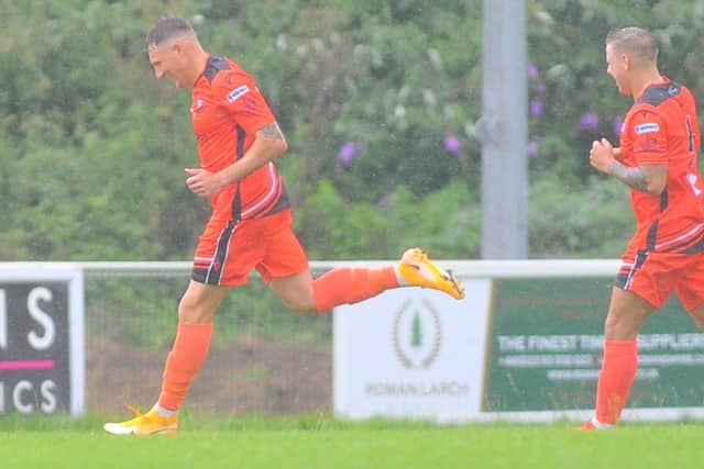 As the rain lashes down, Portchester's Kieran Roberts is all smiles after completing a first half hat-trick. Picture: Martyn White