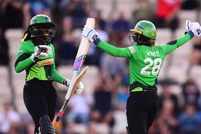 Stafanie Taylor, left, and Danni Wyatt celebrate Southern Brave's win against Birmingham Phoenix. Picture: Harry Trump/Getty Images.