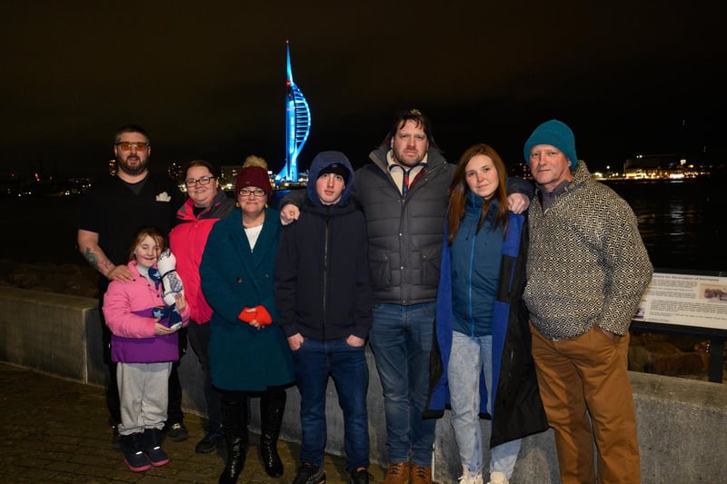 Pictured is: Deryn Martin with close family members as Spinnaker Tower shines blue in memory of Elin Martin.