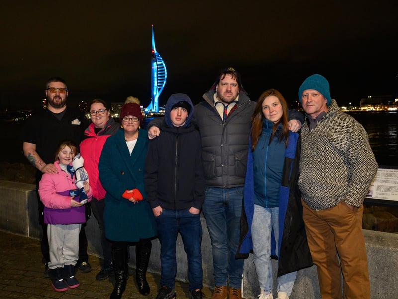 Pictured is: Deryn Martin with close family members as Spinnaker Tower shines blue in memory of Elin Martin.
