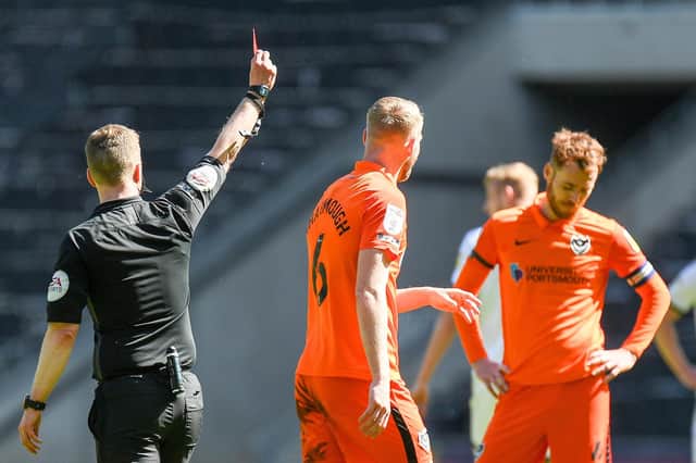 Jack Whatmough picked up a red card for his 80th-minute challenge on MK Dons substitute Charlie Brown.