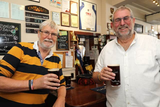 The Rose In June pub in Milton Road is one of many that will be reopening. Pictured here are punters Bill Alderman, left, and Howard Davis. Picture: Chris Moorhouse