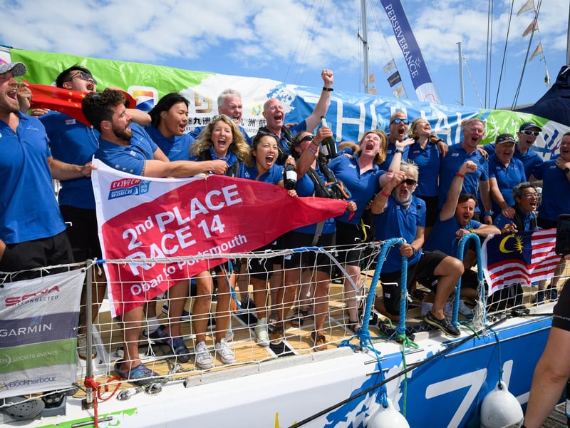 The Zhuhai team celebrate coming third in the race.Picture: Keith Woodland (270721-71)