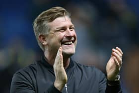 Karl Robinson celebrates the win over AFC Wimbledon Pic: Nigel French/PA Wire.