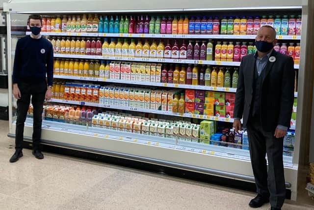 Harry Mooney, one of the managers in charge of the refit at Whiteley's Tesco, and store manager Andy Grainger.