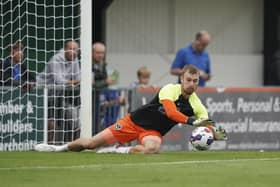 Pompey keeper Will Norris warming up ahead of tonight's friendly at the Rocks. Picture: Jason Brown/ProSportsImages