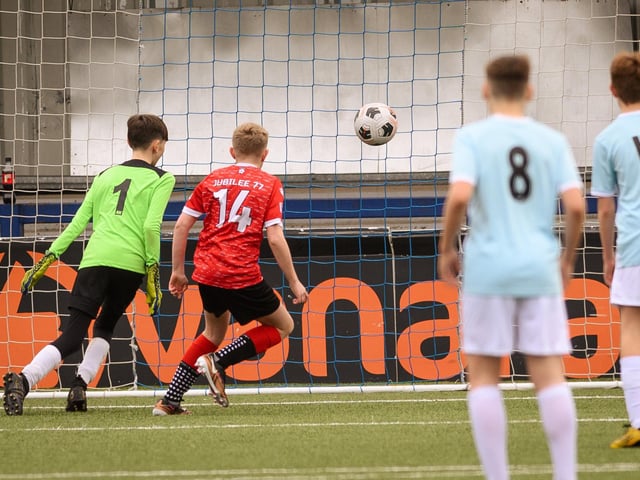Action from the Portsmouth Youth League Geldard Invitation Cup final between Jubilee 77 U13s and Castle United U13s (light blue and white kit). Picture: Keith Woodland (190321-624)