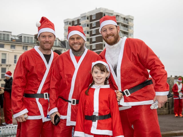 Pictured - Martin with daughter Isla, eight, with Mark and Liam from Portsmouth.