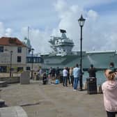 Royal Navy aircraft carrier HMS Prince of Wales approaches The Point as she returns to Portsmouth Naval Base Picture: Ben Mitchell/PA