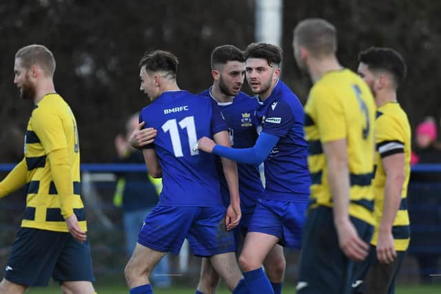 Baffins Milton Rovers celebrate Harry Sargeant's goals in their 2-1 win against Hamworthy last December, the Hammers' only league loss of the season in 38 games. Picture: Neil Marshall