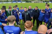 Baffins boss Danny Thompson speaks to his players after their Wessex League Cup final win over Petersfield in May 2023. Picture by Nathan Lipsham