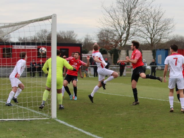 Curt Robbins heads Fareham's first goal. Picture by Ken Walker