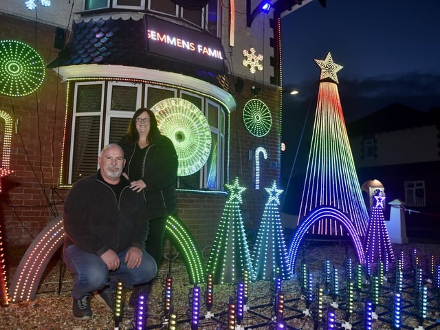 The Semmens Family Light Show in Highbury Grove in Cosham, which is a big hit in the area.
Pictured is: Myles (52) and Kelly Semmens (50).
Picture: Sarah Standing (111223-3393)